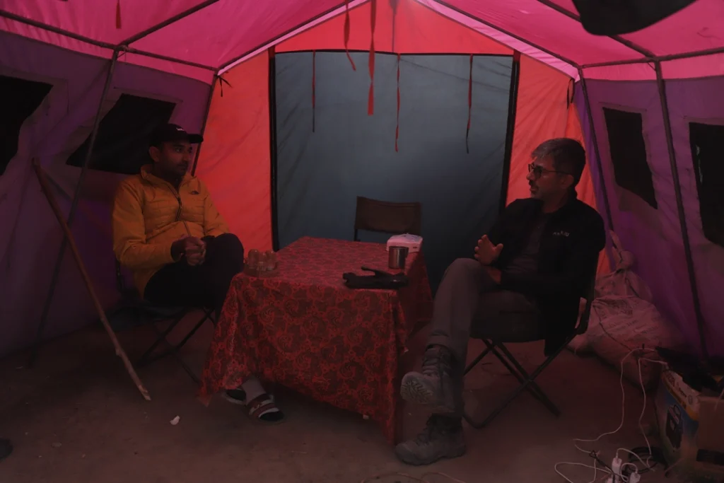 Discussion during K2 Concordia Basecamp trek while in Khuburse campsite during snowfall