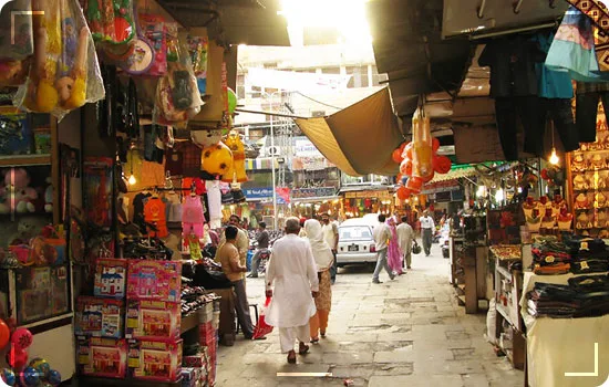 Anarkali Bazaar Lahore: vibrant traditional market street filled with colorful clothes, jewelry, and handicrafts on our guided Lahore city tours
