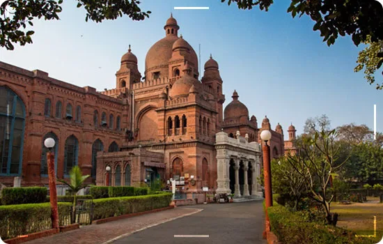 Lahore Museum on Mall Road: historic brick building housing the Fasting Buddha and Gandhara art collections on our guided Lahore city tours