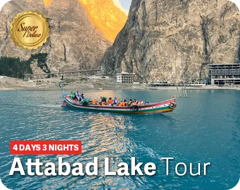 Boats floating on the turquoise waters of Attabad Lake surrounded by rugged mountains - book attabad tour now with pakistan tour and travel