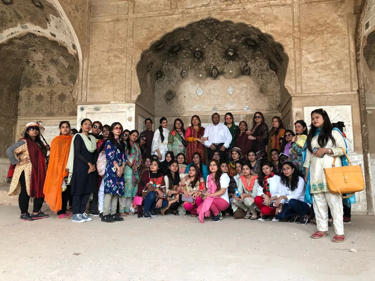 Travel group exploring the historical streets on an Androon Lahore Walled City Tour