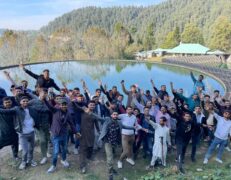 Dunga Gali Water Tanks Group Tour Group of tourists visiting the historic Dunga Gali water tanks during a Galyat tour with Pakistan Tour & Travel