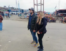 Foreign couple standing on the side of a scenic mountain road in Naran Kaghan Valley