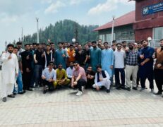 Humming Bird Resort and Executive Suites Murree Tour Group of tourists posing outside Hummingbird Resort and Executive Suites during a Murree tour package by Pakistan Tour & Travel