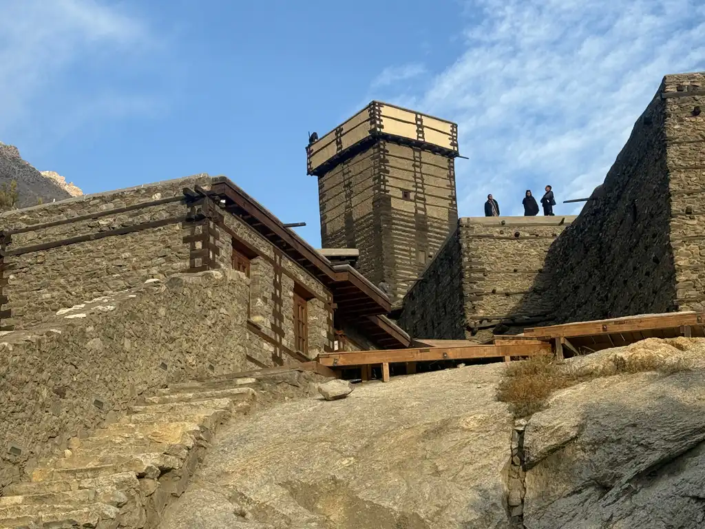 Altit Fort watchtower built on a cliff above the Hunza River