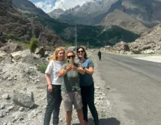 Female Friends Selfie on Karakoram Highway Three female friends taking a selfie in a happy mood along the Karakoram Highway in Hunza