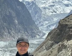 Tourist Close-up at Hopper Glacier Nagar Close-up shot of a female tourist smiling at Hopper Glacier viewpoint in Nagar Valley