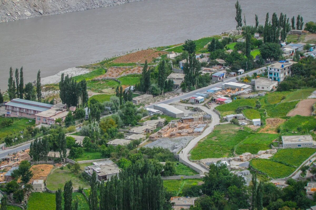 Aerial view of Gulmit Village surrounded by mountains in Upper Hunza