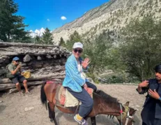 Horseback Riding in Hunza Meadows Equestrian trail riding through lush alpine meadows in Hunza Valley