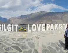 Three Mountain Ranges Junction Monument Landmark sign marking the junction of Karakoram, Himalaya, and Hindu Kush mountain ranges near Gilgit