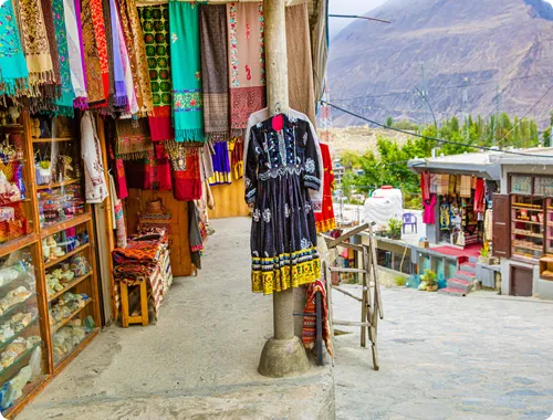 Cobblestone streets of Karimabad Bazaar lined with craft shops and cafes