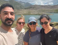 Scenic Shoreline of Lulusar Lake Tour group enjoying the pristine blue alpine waters of Lulusar Lake in Naran Kaghan