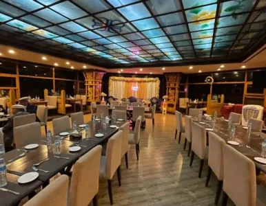Hunza Darbar Hotel - In-House Restaurant In-house restaurant dining area at Hunza Darbar Hotel Karimabad